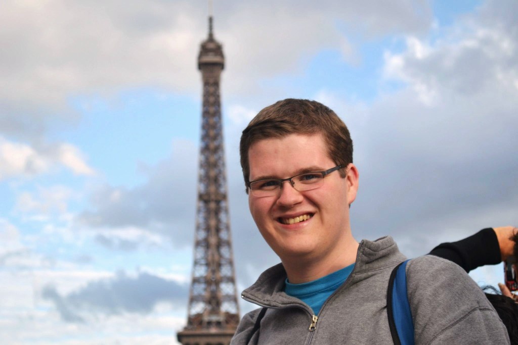 Me in front of the Eiffel Tower back in 2012 - I look so happy because I was!  Photo by Alexandria Mueller or Jay Woofter.